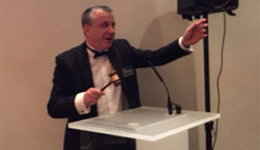 Our Auctioneer Phillip Arnold at TV/E Global Sustainability film awards - 8 December 2014