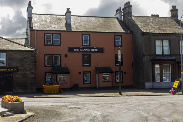 Photo of lot The Grapes Hotel, Market Square, Aspatria, Wigton, Cumbria CA7 3HB